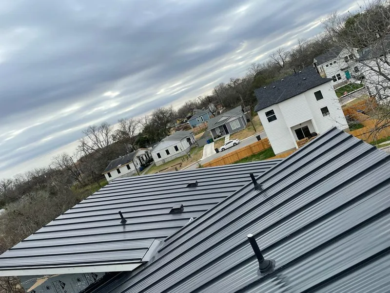 Standing seam metal roof panels with vents for Skylight Repair in St. Robert